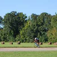 Mississippi - Cyclist passing by the Bear Creek Mound site.