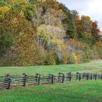 Cyclists gliding by Burns Branch on a beautiful fall day.