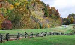 Cyclists gliding by Burns Branch on a beautiful fall day.