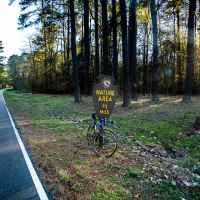 Cyclist taking a break near milepost 19.