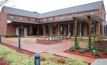The Center is constructed with period materials and period architectural details including a porch and dogtrot.