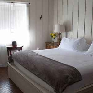 First level bedroom with a king size bed.