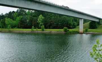 This section of the Tennessee-Tombigee Waterway is a man-made canal that connects the Tennessee River to the north with the Tombigbee River to the south.