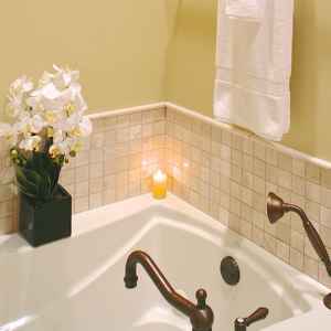 en-suite bathroom with Jacuzzi bath and separate walk in shower