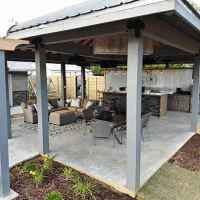 Covered kitchen, wetbar and sitting area.