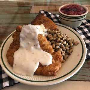 Country Fried Pork Chop with Creamed Potatoes, Purple Hull Peas, Cornbread, Blackberry Cobbler