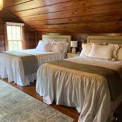 The Wisteria Room - two queen beds, sitting area, private bathroom