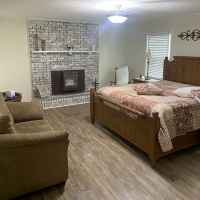 House Across the Street - Bedroom with a King Size Bed