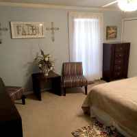 Suite A - Bedroom with a Queen Size Bed