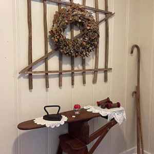 Antique Ironing Board and Tobacco Sticks